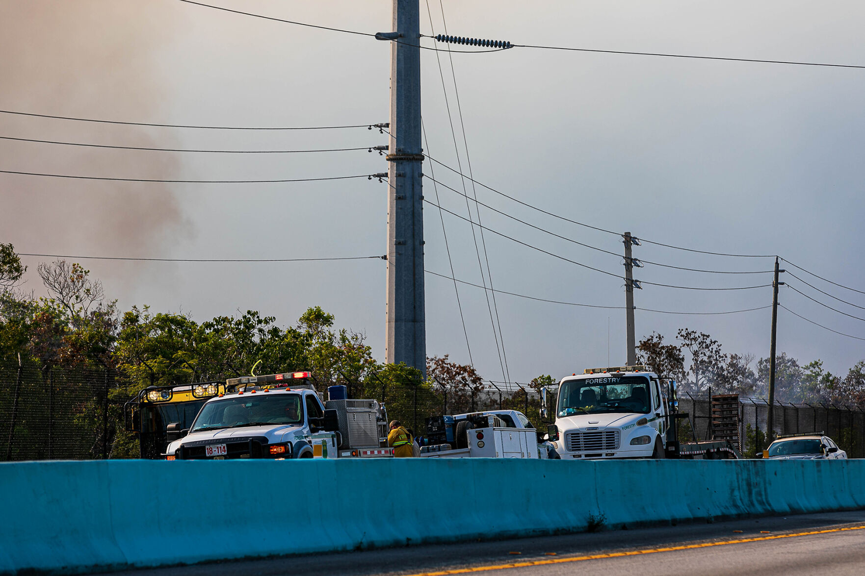 Florida Forestry Service Fire Units were staged at Mile Marker 124 monitoring the fire.
